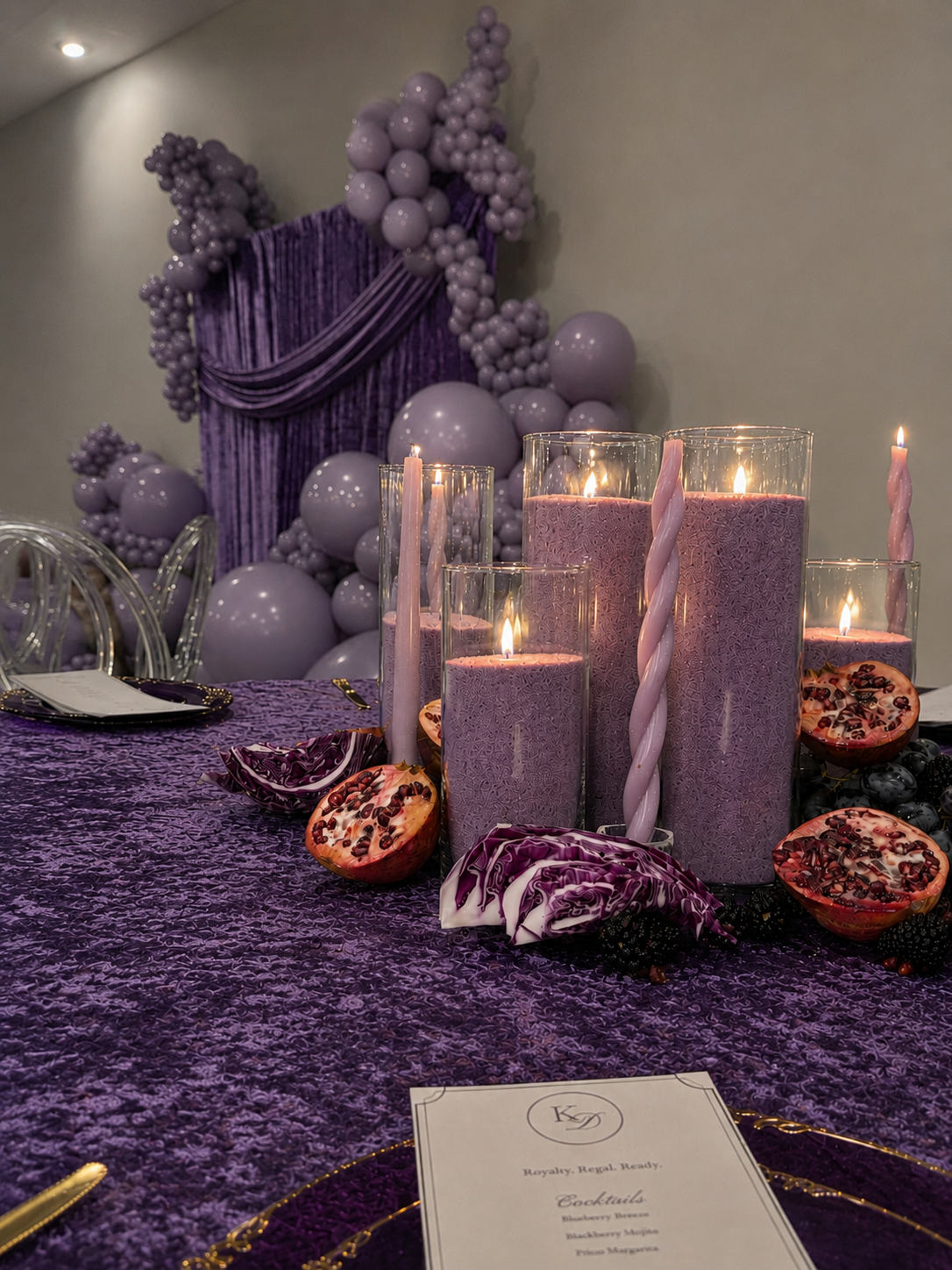 Bridal Shower in Lavender with monochromatic candles, draping, and guest tablescape details