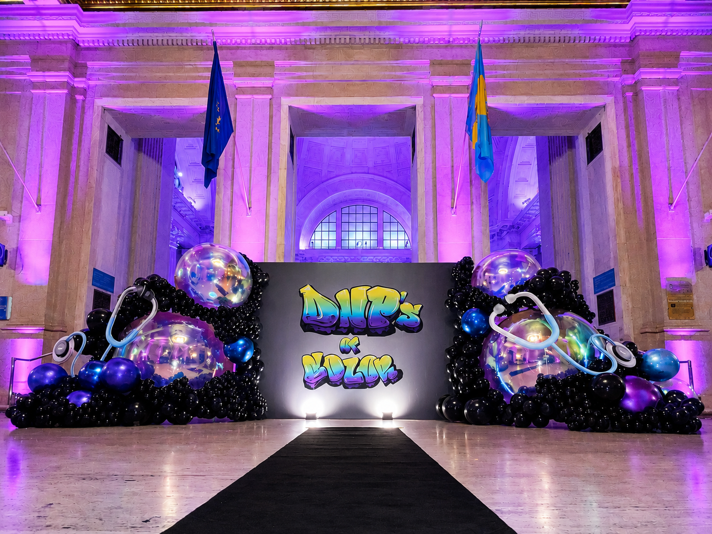 DNPs of Color Gala with large-scale branded installation and statement lighting